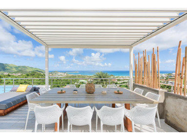 Pergola bioclimatique Inula adossée sur-mesure
