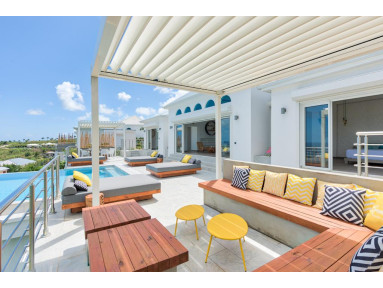 Pergola bioclimatique Inula adossée sur-mesure