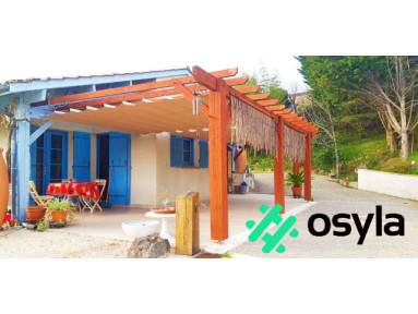 Pergola coulissante Mexico fixation de mur à mur avec toile rétractable et lambrequin