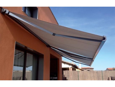 Store banne coffre Olinda à bras invisibles toile micro-perforée PVC Sunworker Dickson avec lambrequin