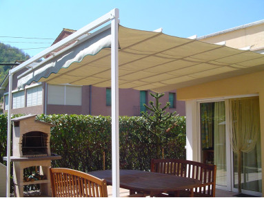 Pergola coulissante Mexico fixation de mur à piliers avec toile étanche Orchestra Max Dickson
