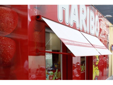 Store à bras droit avec semi-coffre